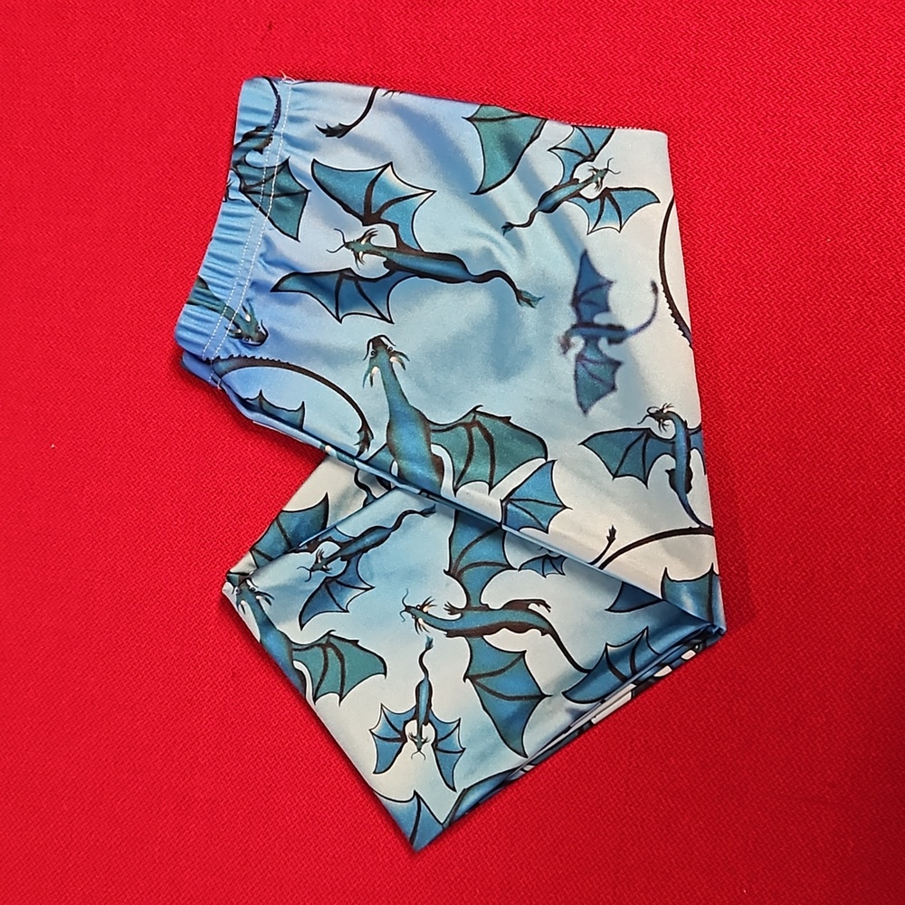 Blue green flying dragons pterodactyl Jurassic leggings EUC
